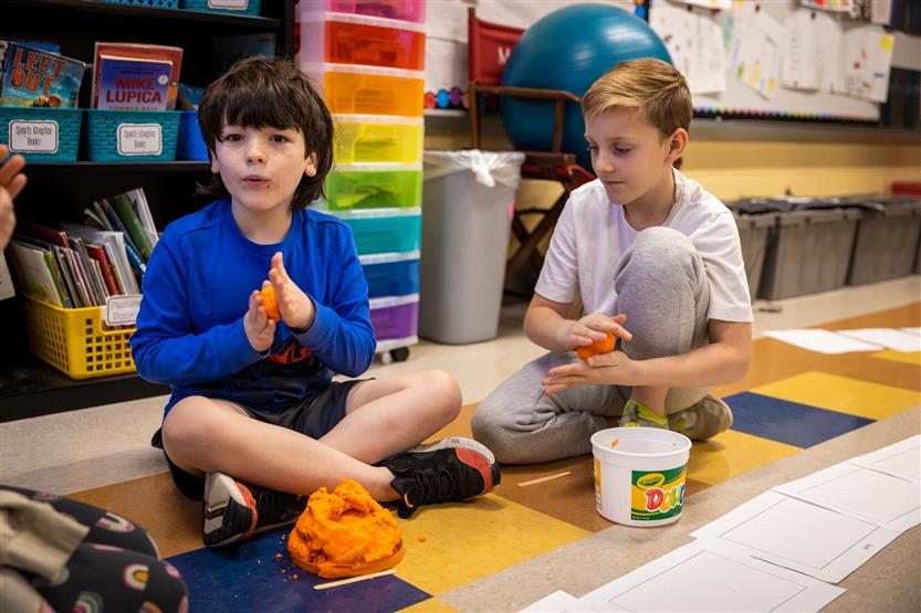 Students make planets out of Play-Doh
